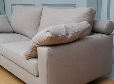 Modern sofa with roller head restraints