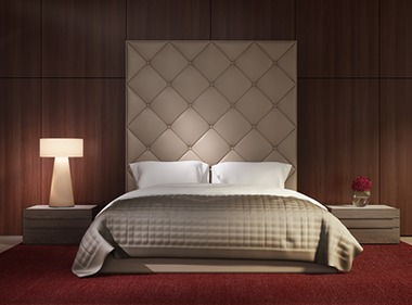 Letto con testiera in pelle