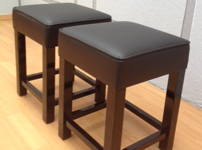 Stool in black lacquered wood