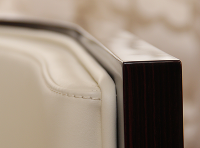 leather chair with a curved wooden back