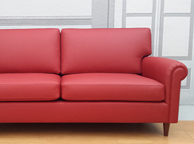 Sofa with arm curl leather-colored geranium
